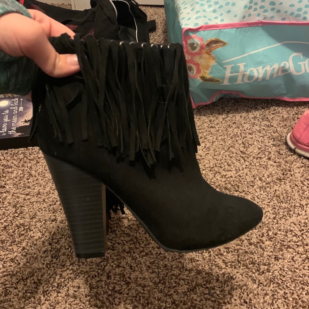 Fringed black booties